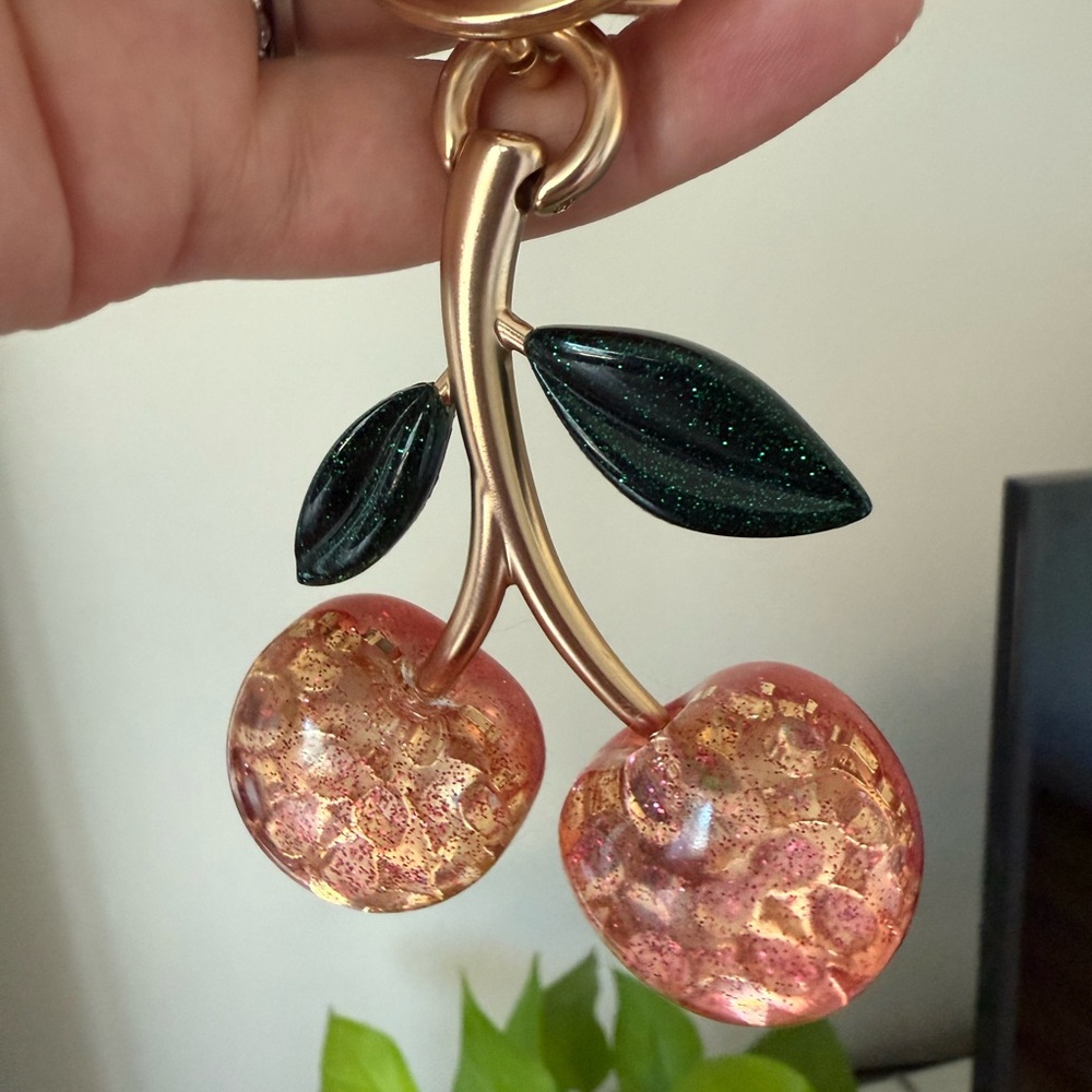 Coach cherry charm